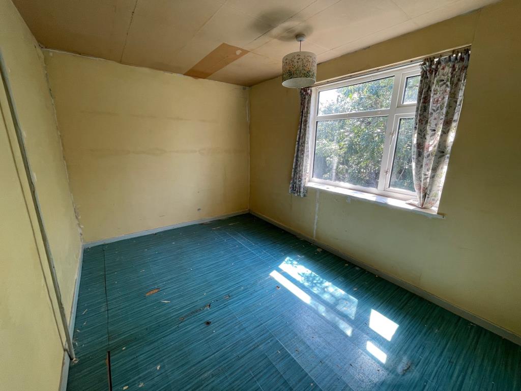 Lot: 11 - SEMI-DETACHED HOUSE FOR IMPROVEMENT AND REPAIR - Bedroom 2 with window to the rear